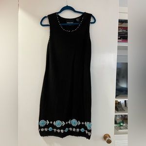 Shift knit dress. Embellished with silver and turquoise beads on bottom.